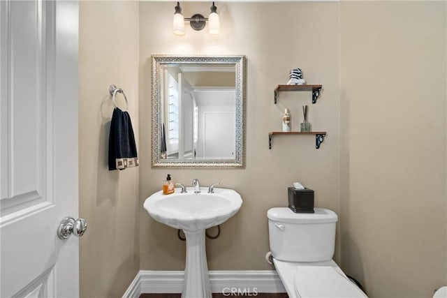 bathroom featuring toilet