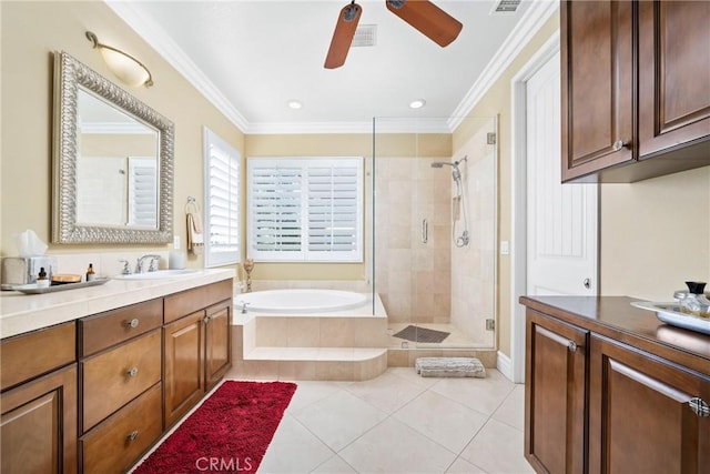 bathroom featuring vanity, crown molding, independent shower and bath, and tile patterned flooring