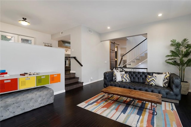 living room featuring dark hardwood / wood-style flooring