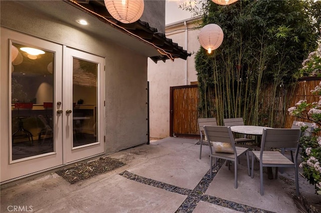 view of patio terrace at dusk