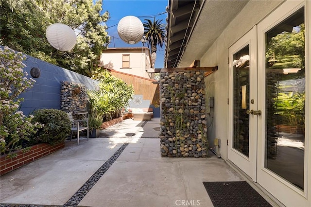 view of patio featuring french doors