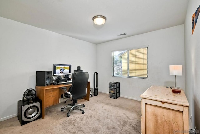 office space featuring light carpet