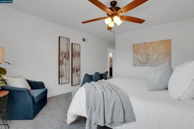 bedroom with ceiling fan and carpet floors