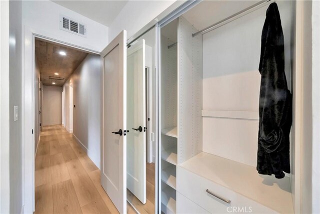 hall featuring light hardwood / wood-style floors