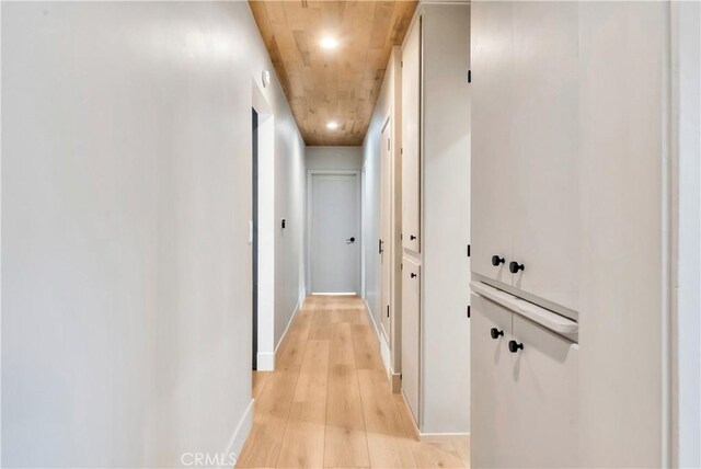 corridor with wooden ceiling and light wood-type flooring