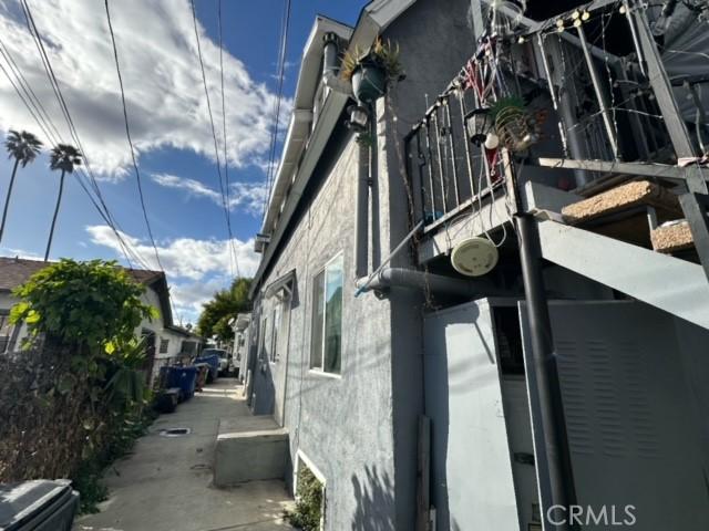 4210 Woodlawn Ave, Los Angeles, CA 90011 - view of property exterior featuring stucco siding