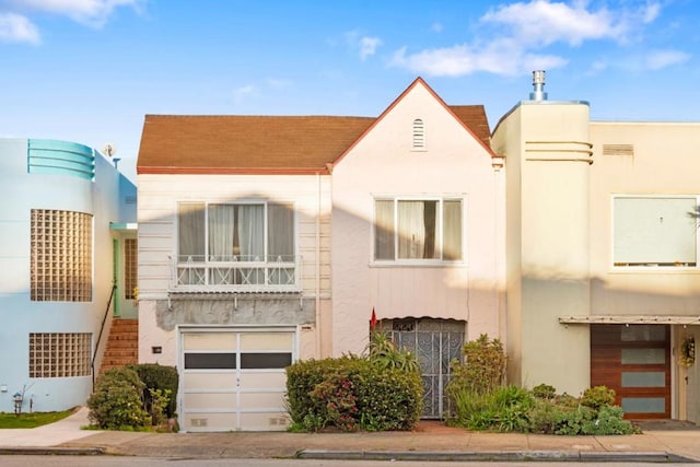 view of front of home with a balcony