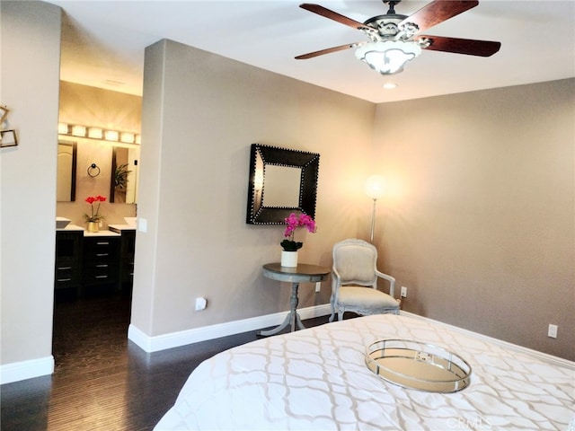 bedroom featuring dark wood-type flooring and ceiling fan