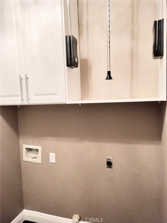 laundry room with cabinets and washer hookup