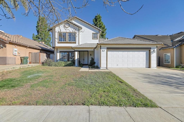 view of front facade with a front lawn and a garage