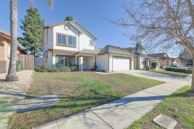 view of front property with a front lawn and a garage