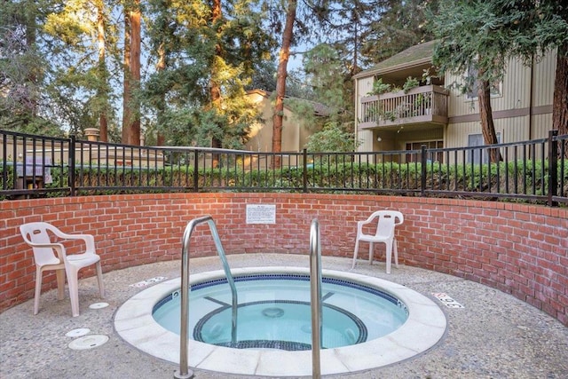 view of pool featuring a community hot tub