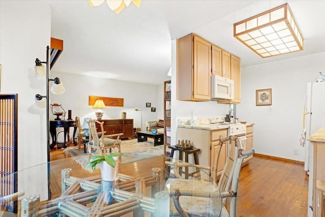 dining room featuring light hardwood / wood-style floors