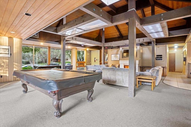 game room featuring wooden ceiling, billiards, light carpet, lofted ceiling with skylight, and wood walls