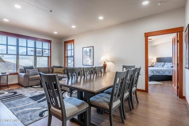 dining space with light hardwood / wood-style floors