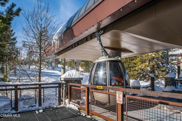 view of snow covered deck