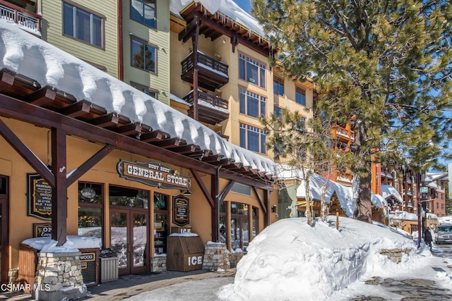 view of snow covered building