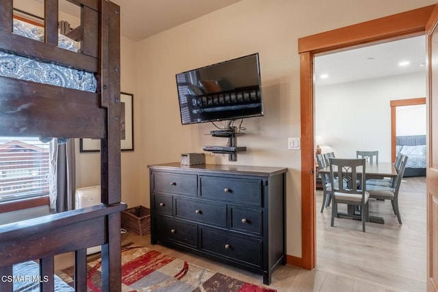 bedroom with light hardwood / wood-style floors