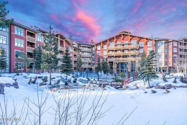 view of snow covered property