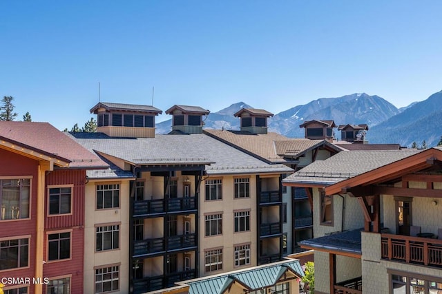 exterior space featuring a mountain view