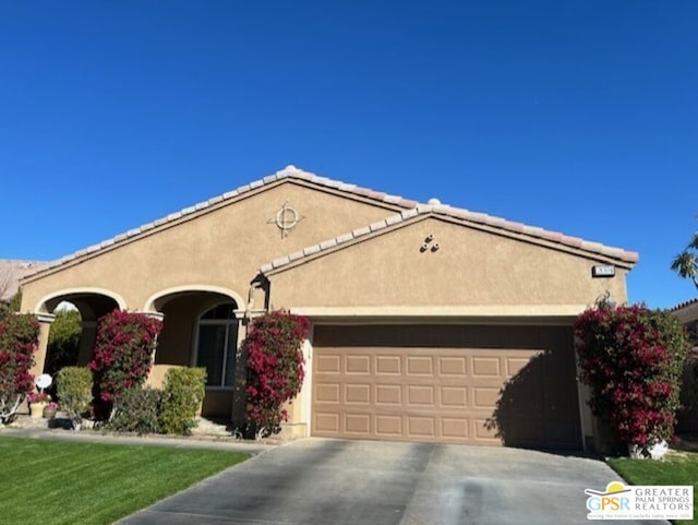 ranch-style house with a garage