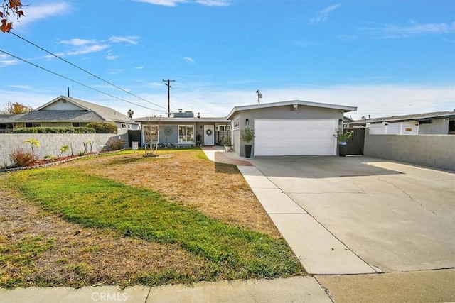 ranch-style house with a front yard and a garage