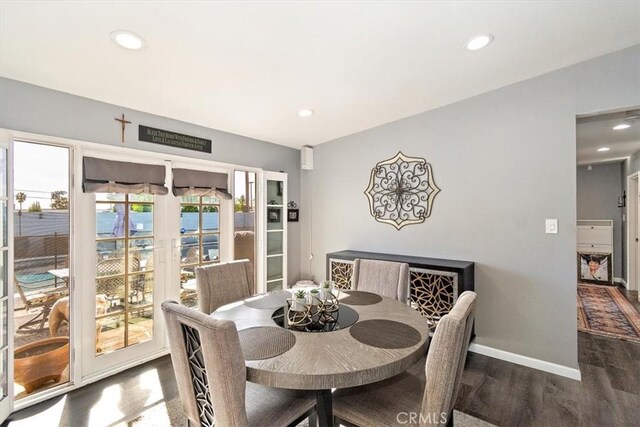 dining space featuring hardwood / wood-style flooring