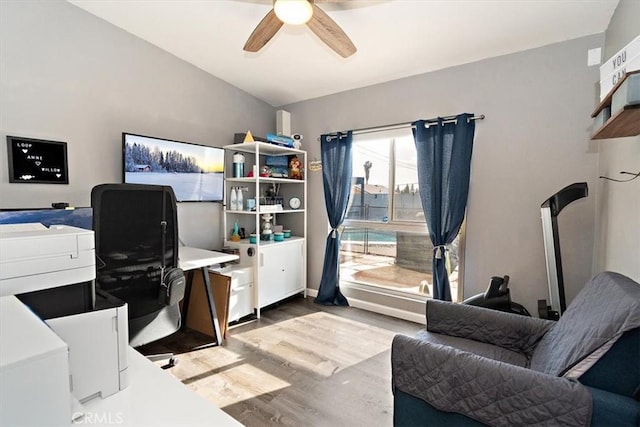 office space featuring ceiling fan and hardwood / wood-style flooring