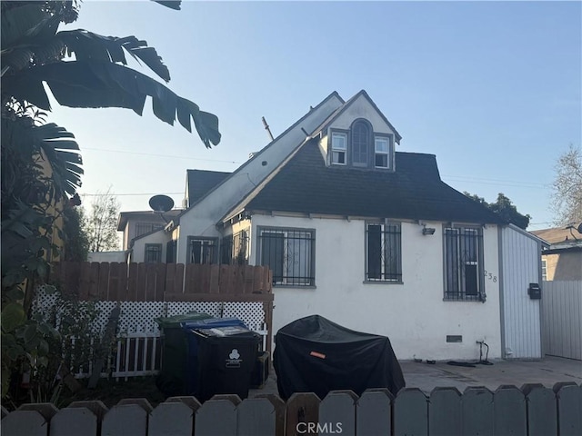 view of home's exterior featuring a patio