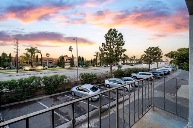 view of parking at dusk