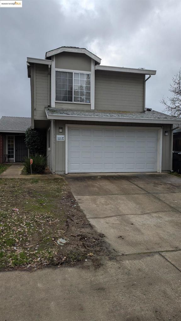 front of property featuring a garage