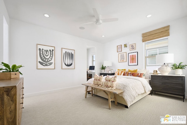 carpeted bedroom with ceiling fan