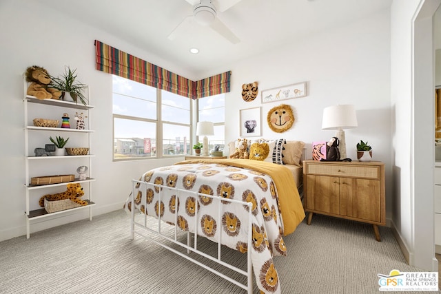 bedroom with light carpet and ceiling fan