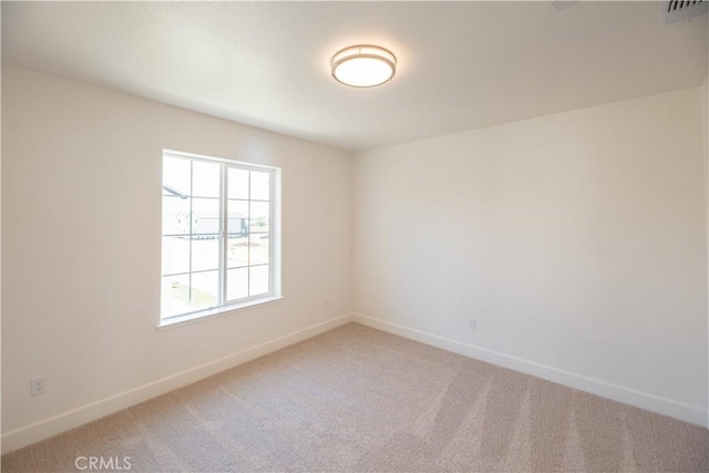 unfurnished room with carpet floors