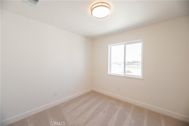 empty room featuring carpet floors