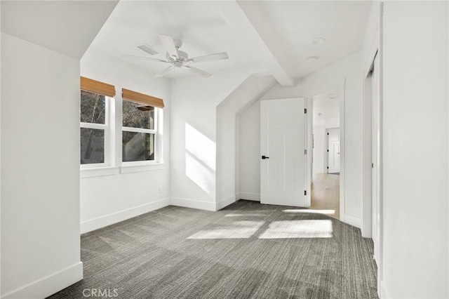 bonus room featuring ceiling fan and carpet