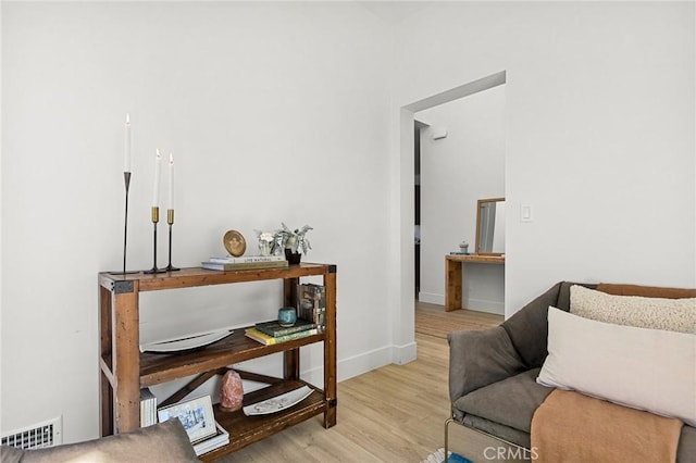 living area with light wood-type flooring