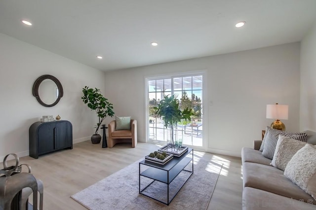 living room with light hardwood / wood-style floors