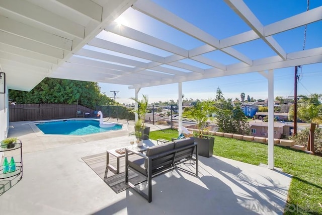 view of pool with a lawn, a patio area, and a pergola