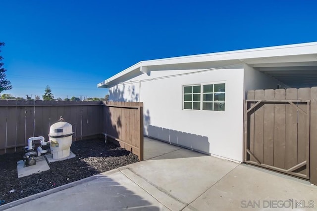 view of home's exterior with a patio area