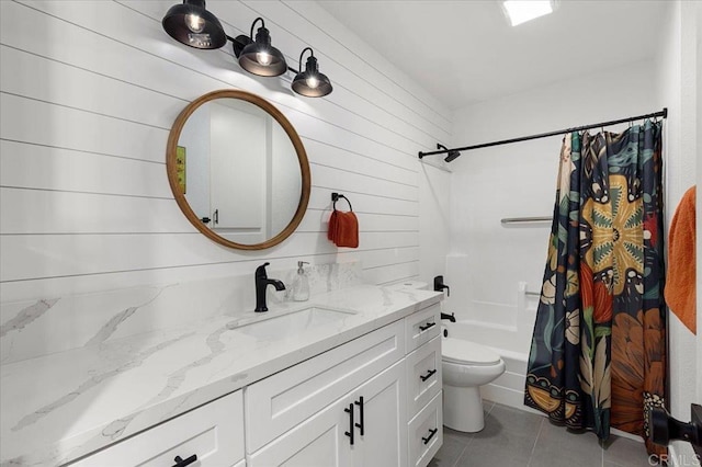 full bathroom with tile patterned flooring, wood walls, toilet, shower / tub combo with curtain, and vanity