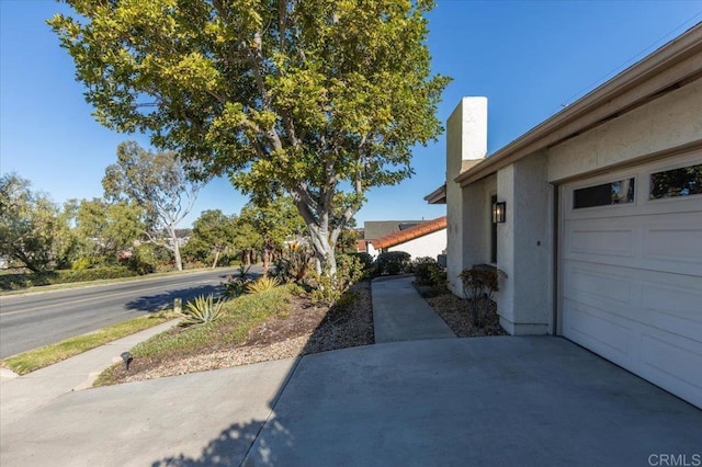 view of yard with a garage