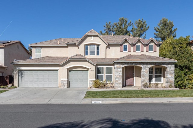 view of front of house with a garage