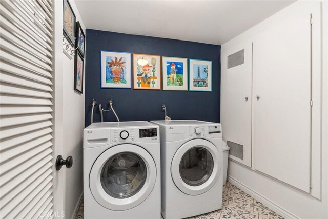 laundry area featuring separate washer and dryer