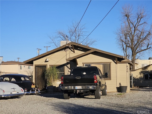 view of side of property with a garage