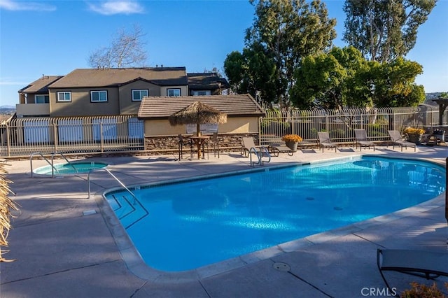 view of pool with a patio area