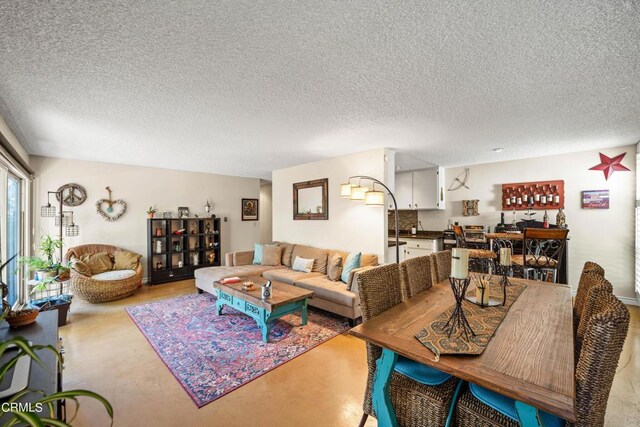 living room with a textured ceiling