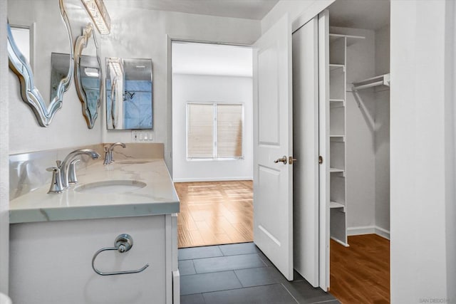 bathroom with vanity and tile patterned floors