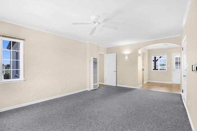 carpeted empty room with ceiling fan