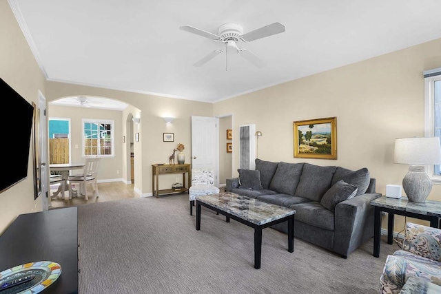 living room featuring ceiling fan and light colored carpet